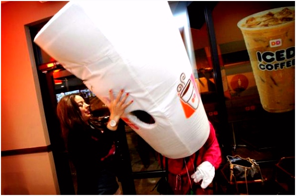 DUNKIN DONUTS Dozens camp out for early morning pastries coffee